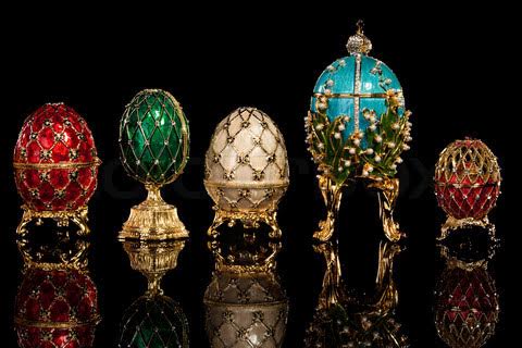 Group Faberge eggs. Isolated on black.