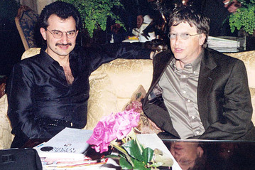 Prince Alwaleed bin Talal and Bill Gates during a meeting in the George V Four Seasons Hotel in Paris.