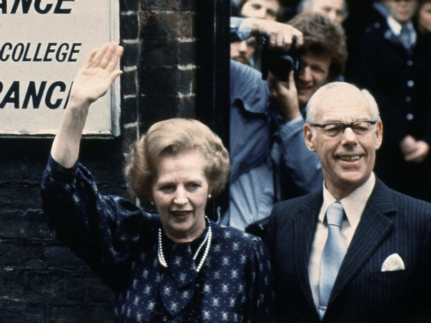 British Prime Minister Margaret Thatcher leaves the polling station with her husband, Dennis, after casting their votes in the 1983 general election. Photo: AP/Peter Kemp