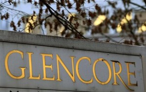 The logo of commodities trader Glencore is pictured in front of the company's headquarters in Baar