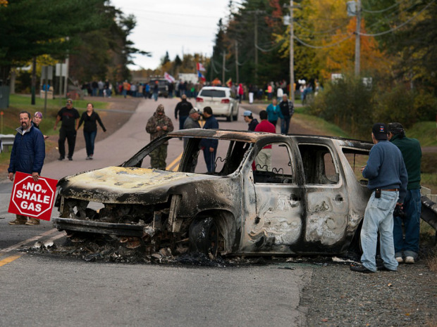 A police vehicle is seen in Rexton, N.B. on October 17, 2013, during a demonstration against shale gas exploration in eastern New Brunswick. Photo: THE CANADIAN PRESS/Andrew Vaughan