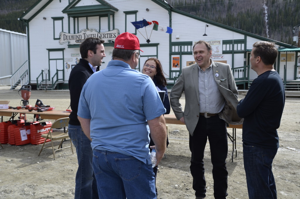 People in photo: Hon. Currie Dixon, Minister of Public Service Commission and Community Services. Tammie Pasloski, Premier’s Wife. Hon. Darrell Pasloski, Yukon Premier Other two men are local exhibitors at the annual Dawson City Gold Show. Photo Credit: Government of Yukon