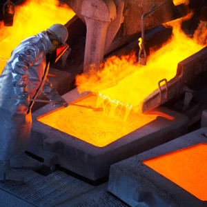 Anibal Contreras clears slag at the Altonorte metallurgical facility, north Chile