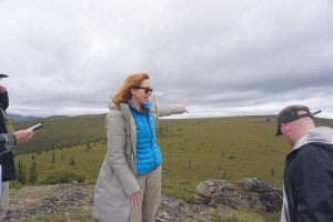 Kaminak CEO Eira Thomas outlines the proposed heap-leach pad location during August site visit. Photo: Michael McCrae/MINING.com